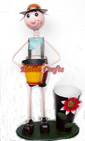 metal boy with garden pot decoration 