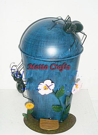 metal dustbin with garden decoration 